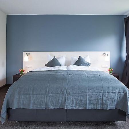 Alpengluehen Smart Hotel Olching Chambre photo