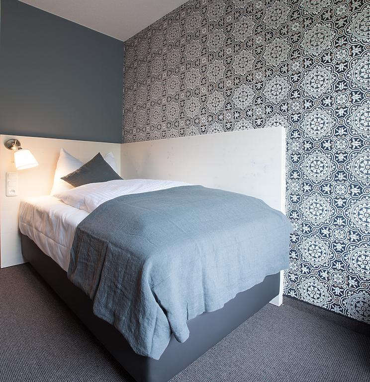 Alpengluehen Smart Hotel Olching Chambre photo